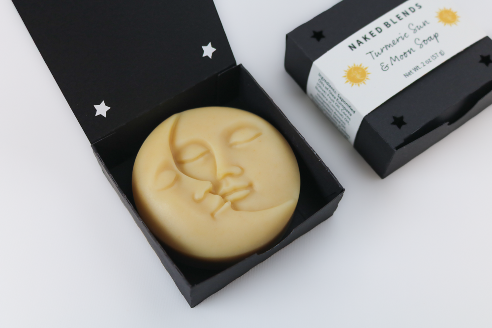 Turmeric Sun and Moon Soap bar with detailed celestial design