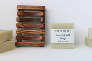 Lemongrass Soap labeled and beside a wooden soap dish