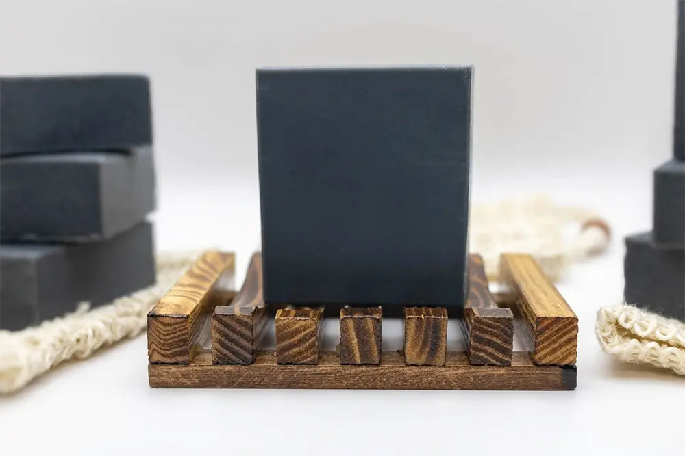 Activated Charcoal Bath Bar in soap dish
