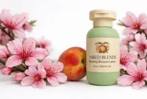 Blushing Blossom Lotion bottle with peach and peach blossoms