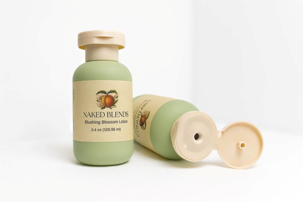 Blushing Blossom Lotion bottles by Naked Blends on a white background
