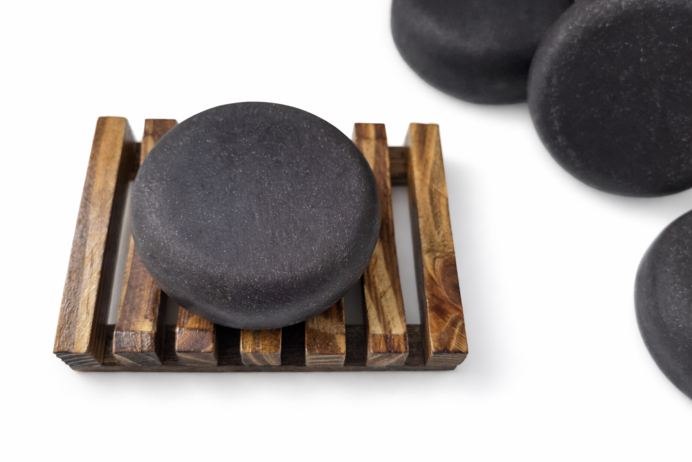 The Working Bar Soap (Payday Bonus) on a Wooden Soap Dish